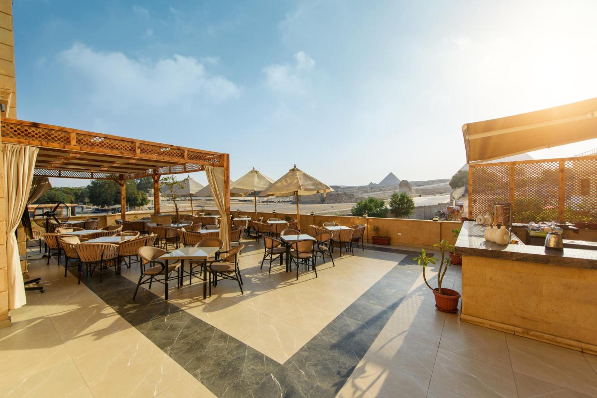 The Gate Hotel Front Pyramids & Sphinx View Kafrat al Jabal Bagian luar foto