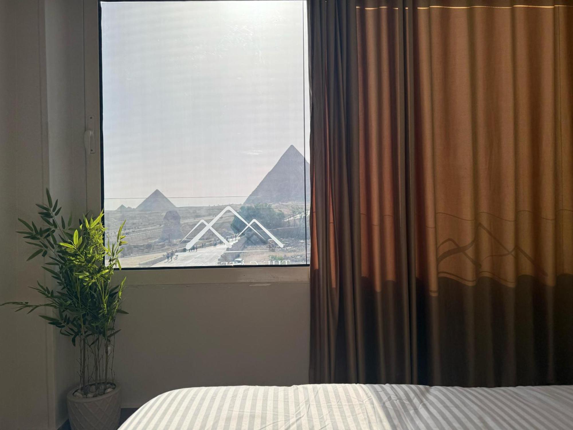 The Gate Hotel Front Pyramids & Sphinx View Kafrat al Jabal Bagian luar foto