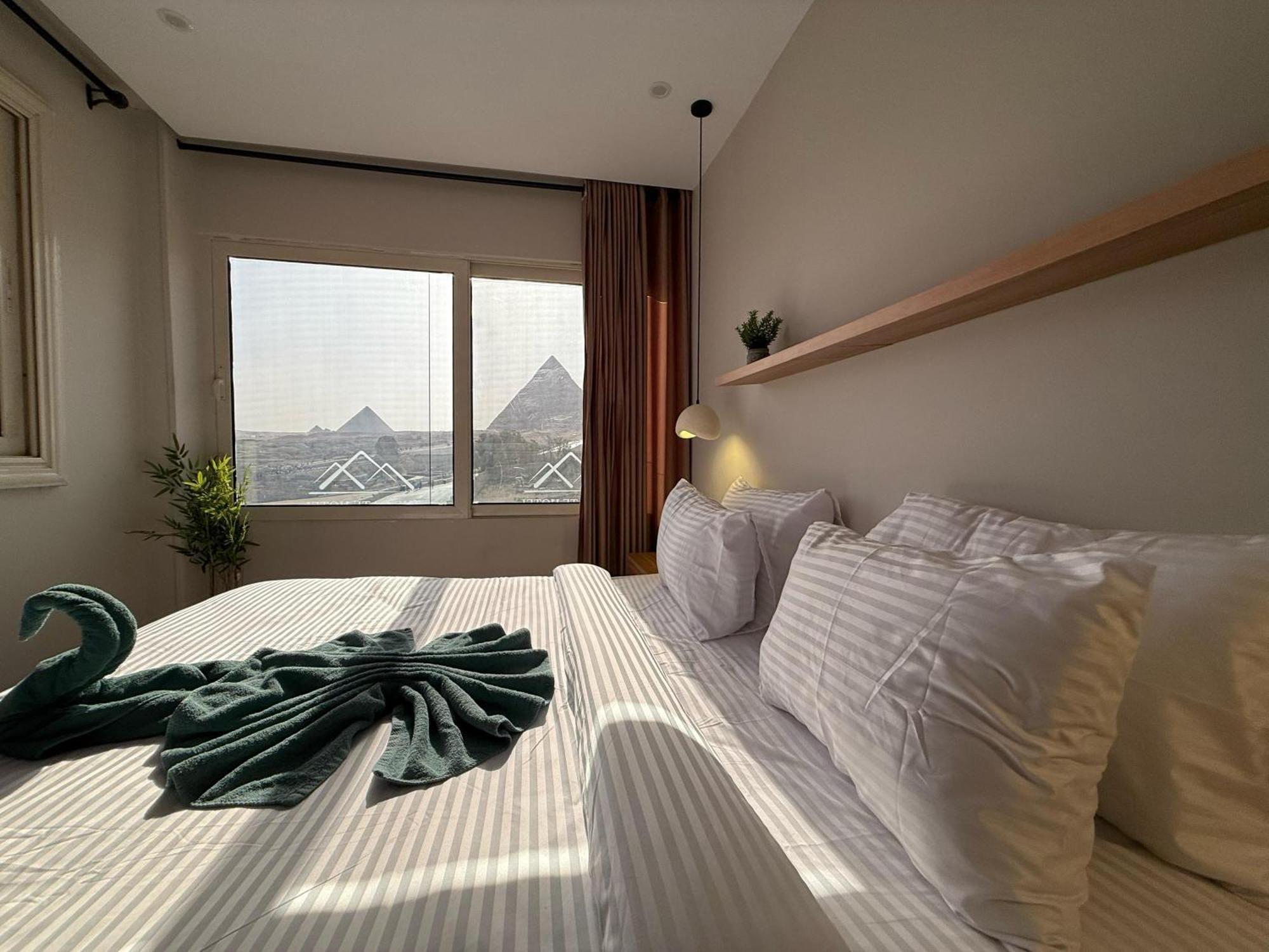 The Gate Hotel Front Pyramids & Sphinx View Kafrat al Jabal Bagian luar foto