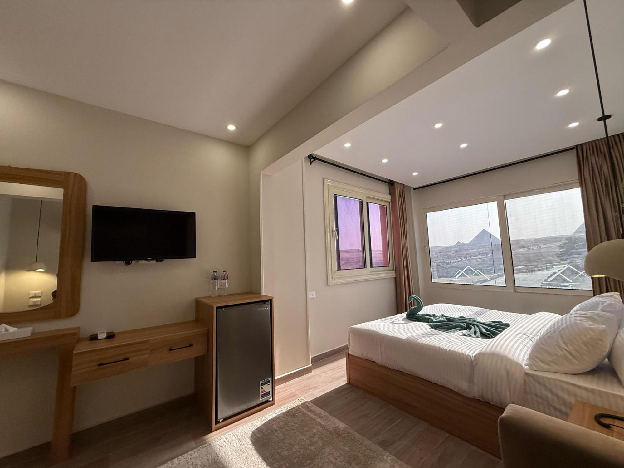 The Gate Hotel Front Pyramids & Sphinx View Kafrat al Jabal Bagian luar foto