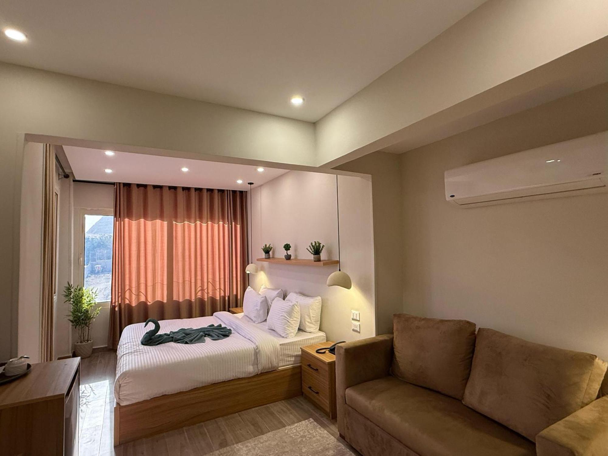 The Gate Hotel Front Pyramids & Sphinx View Kafrat al Jabal Bagian luar foto