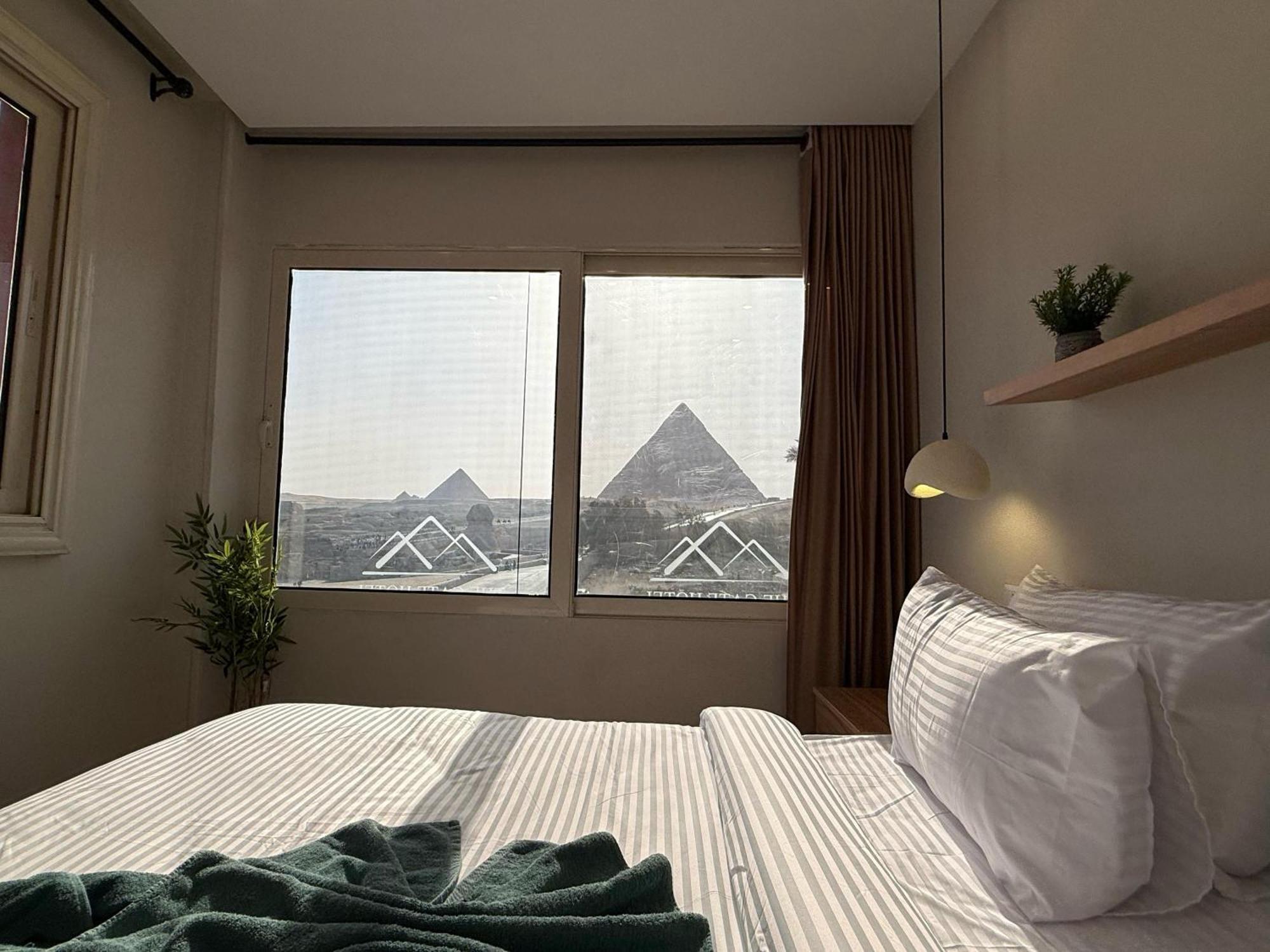 The Gate Hotel Front Pyramids & Sphinx View Kafrat al Jabal Bagian luar foto